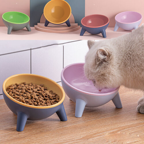Cat using a raised feeding bowl with a 15-degree tilt