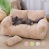 Soft sofa-style cat bed with pillow and anti-slip base
